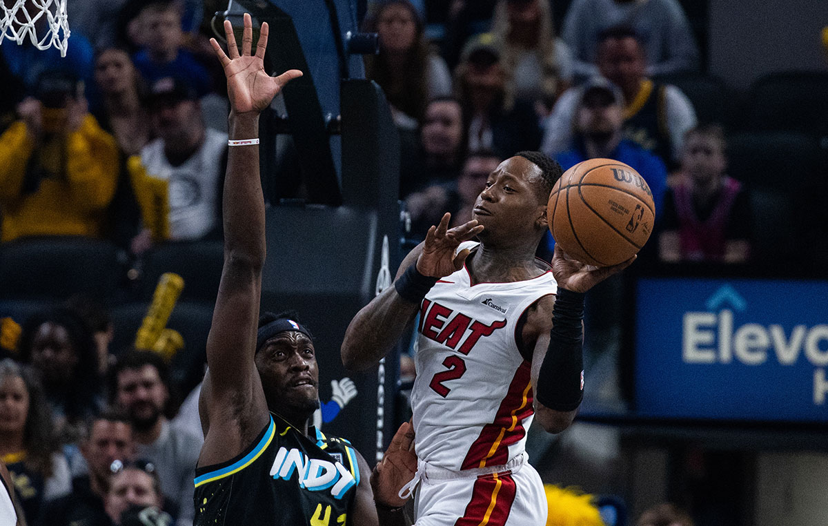 Miami Heat guard Terry Rozier (2) passes the ball while Indiana Pacers forward Pascal Siakam (43) defends in the first half at Gainbridge Fieldhouse.