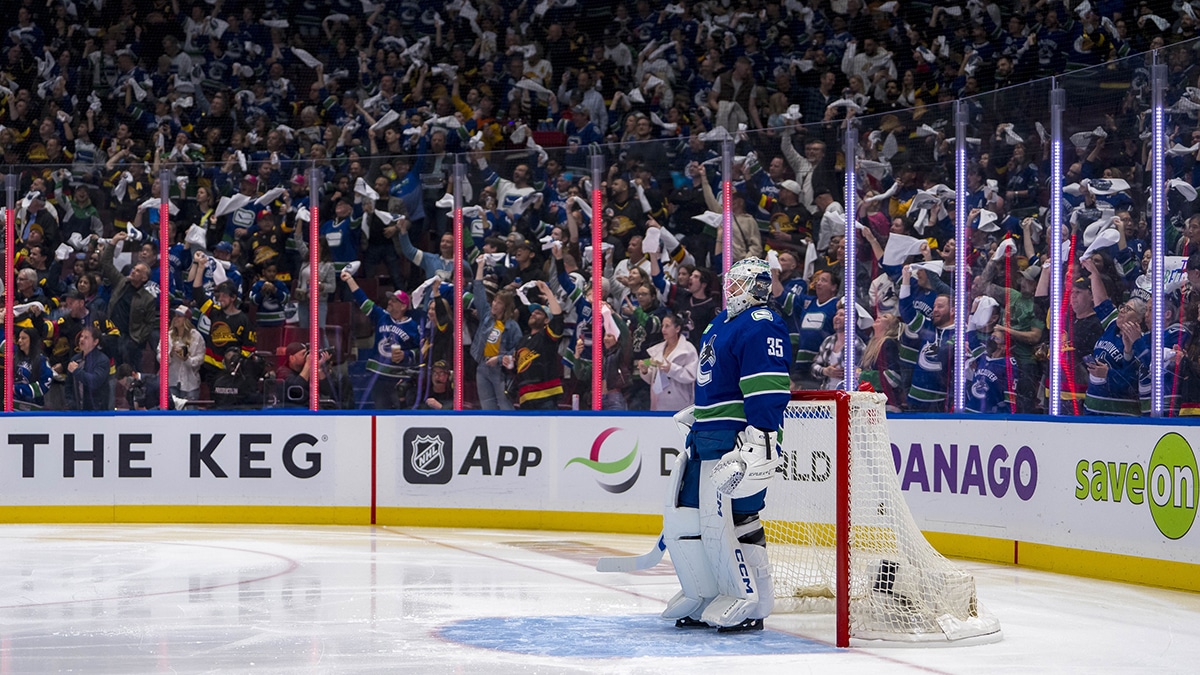 Vancouver Canucks goalie Thatcher Demko (35) watches the Canucks celebrate a goal score by forward Elias Lindholm (23) against the Nashville Predators in the second period in game one of the first round of the 2024 Stanley Cup Playoffs at Rogers Arena.