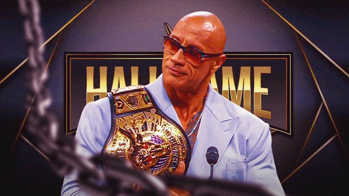 The attached picture of The Rock with his new championship belt with the WWE Hall of Fame logo as the background.