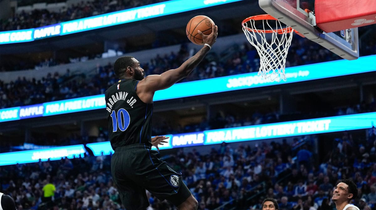 Dallas Mavericks forward Tim Hardaway Jr. (10) scores a layup against the Detroit Pistons during the first half at American Airlines Center. 