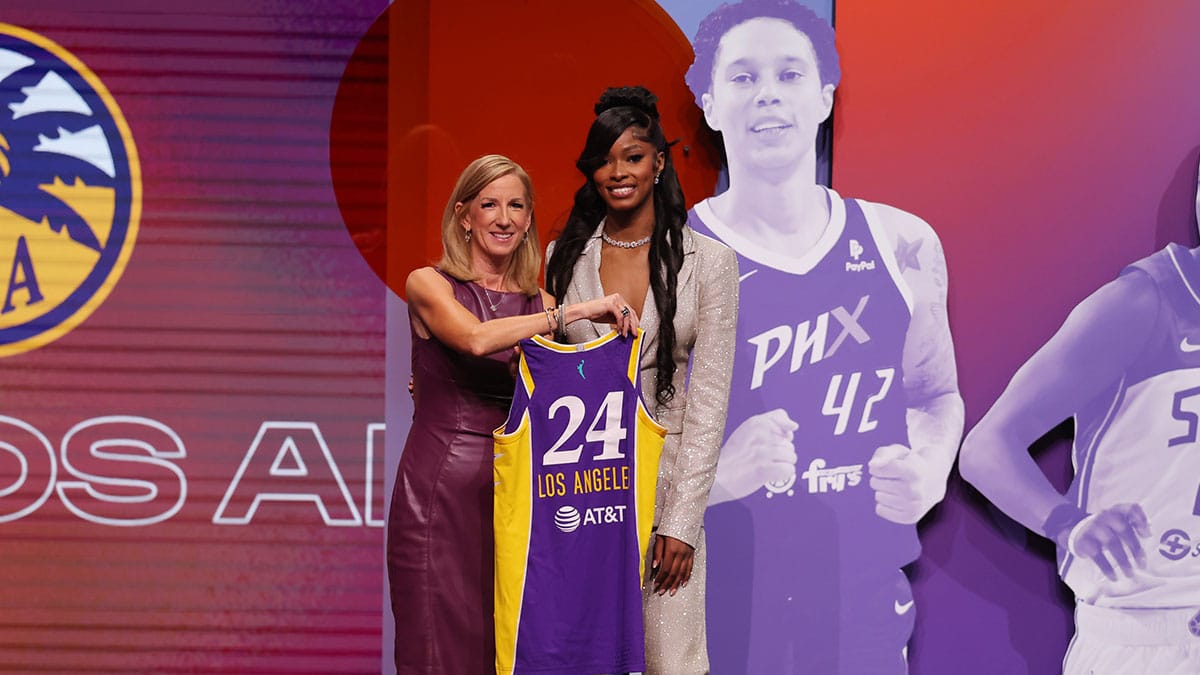 Rickea Jackson poses with WNBA commissioner Cathy Engelbert after she is selected with the number four overall pick to the Los Angeles Sparks in the 2024 WNBA Draft.