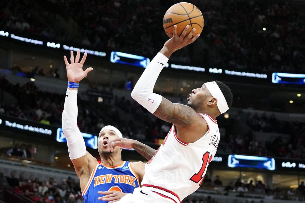 New York Knicks guard Josh Hart (3) defends Chicago Bulls forward Torrey Craig (13) during the first quarter at United Center.