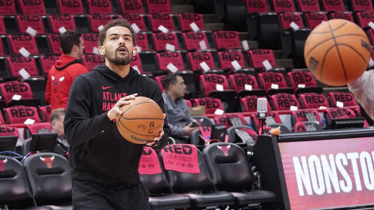 Atlanta Hawks guard Trae Young (11) warms up before a play-in game of the 2024 NBA playoffs against the Chicago Bulls at United Center