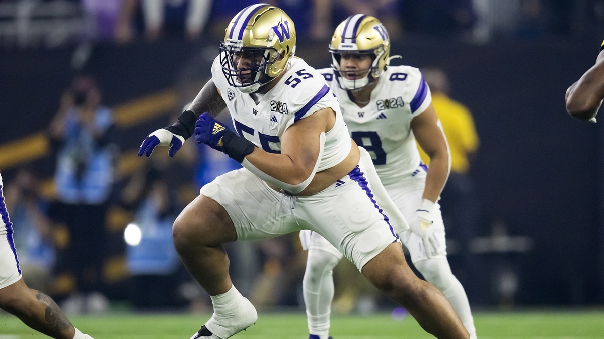 Washington Huskies offensive lineman Troy Fautanu (55) against the Michigan Wolverines during the 2024 College Football Playoff national championship game at NRG Stadium.
