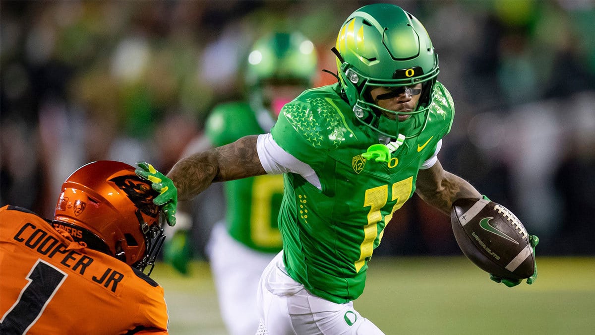 Oregon wide receiver Troy Franklin runs for a touchdown after a catch as the No. 6 Oregon Ducks take on the No. 16 Oregon State Beavers Friday