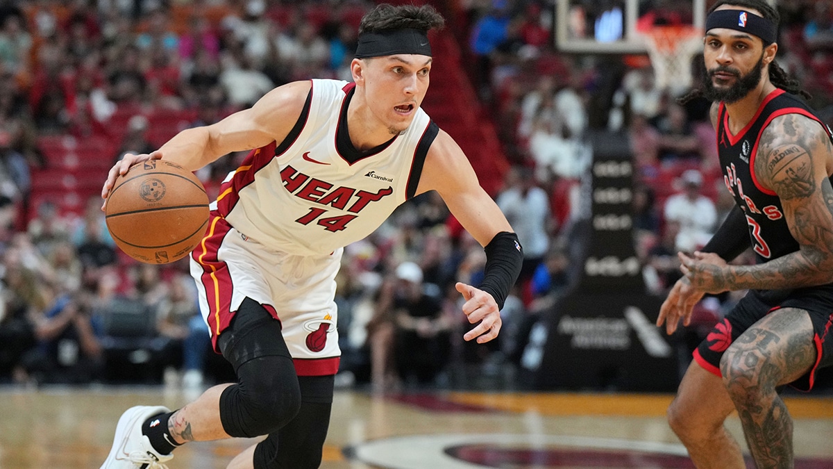 Miami Heat guard Tyler Herro (14) drives to the basket against the Toronto Raptors during the first half at Kaseya Center. 