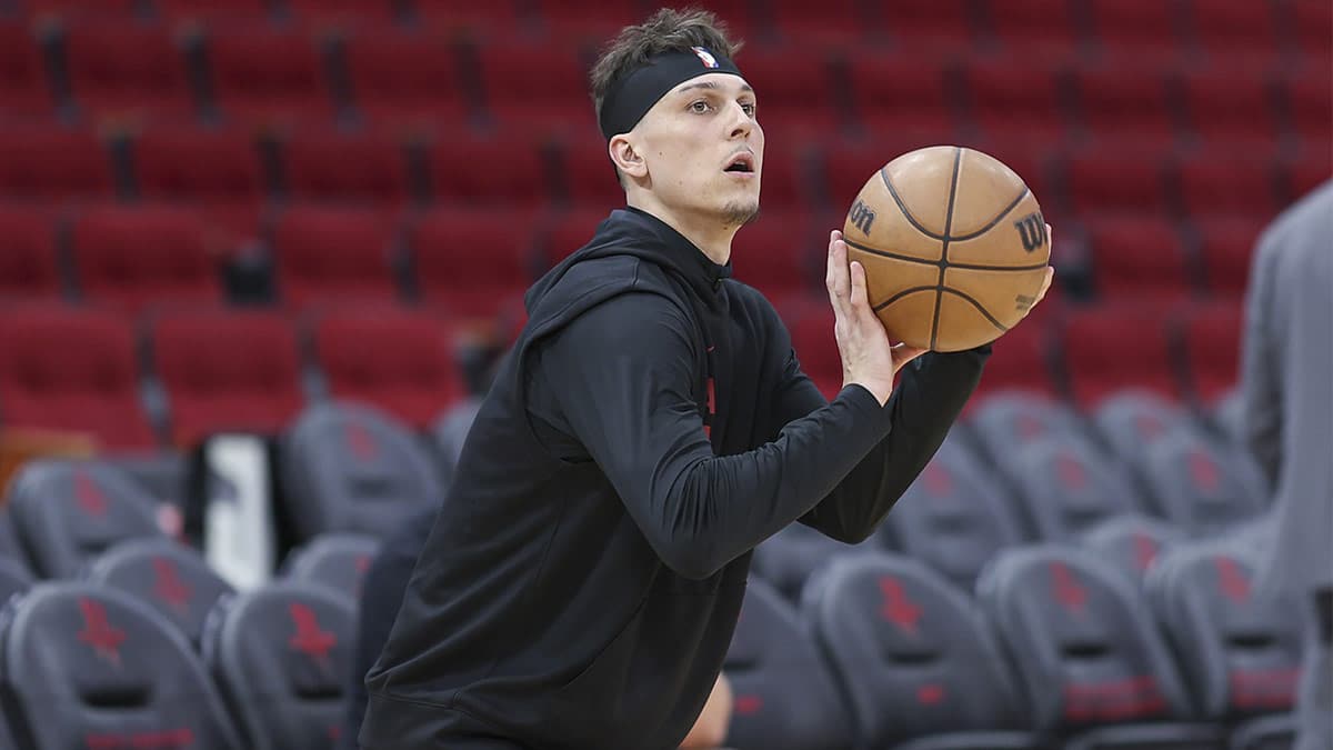 Miami Heat guard Tyler Herro (14) warms up before the game against the Houston Rockets at Toyota Center.