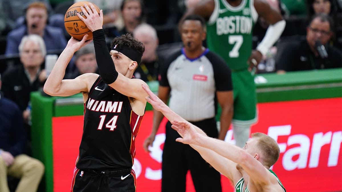 Miami Heat guard Tyler Herro (14) shoots against the Boston Celtics in the second half during game two of the first round for the 2024 NBA playoffs at TD Garden.