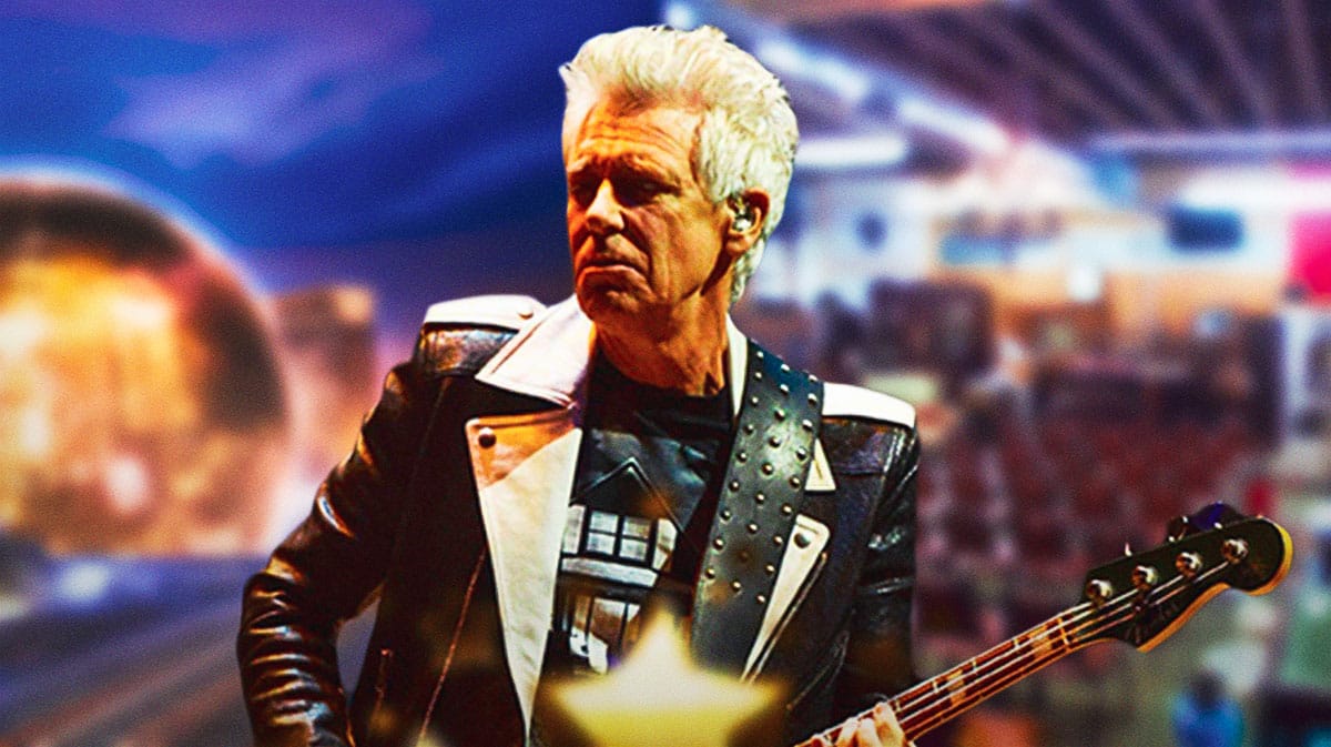 U2 bassist Adam Clayton with Sphere and auction house background.