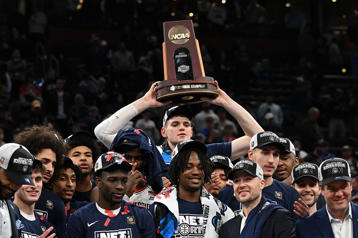 UConn celebrating after advancing to the Final Four during March Madness