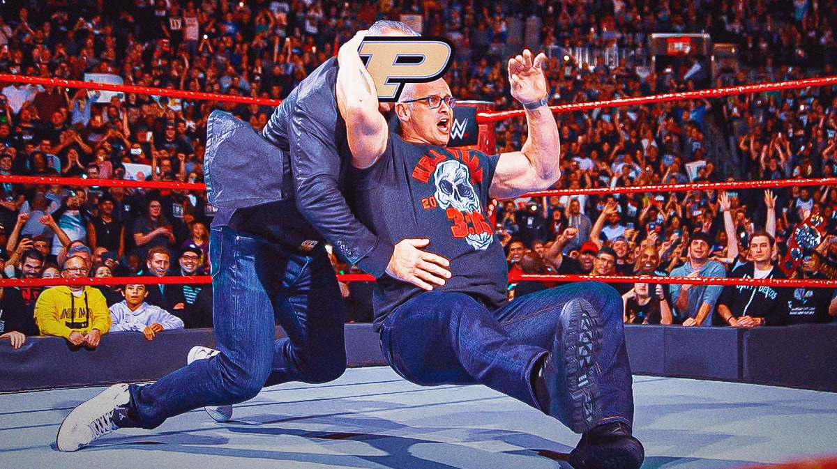 Dan Hurley (UConn basketball) as Stone Cold (RIGHT) and logo of Purdue Boilermakers on the face of the other guy.