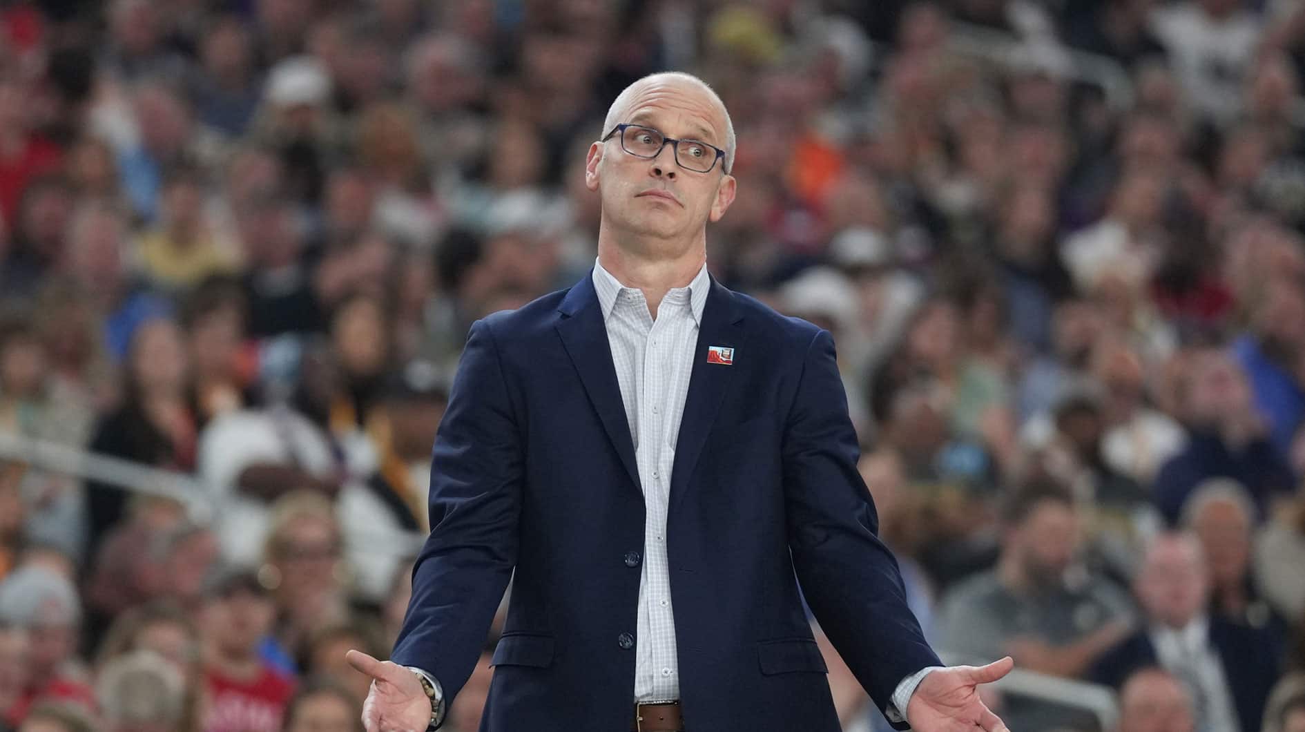 Connecticut Huskies head coach Dan Hurley reacts against the Alabama Crimson Tide in the semifinals of the men's Final Four of the 2024 NCAA Tournament at State Farm Stadium. 