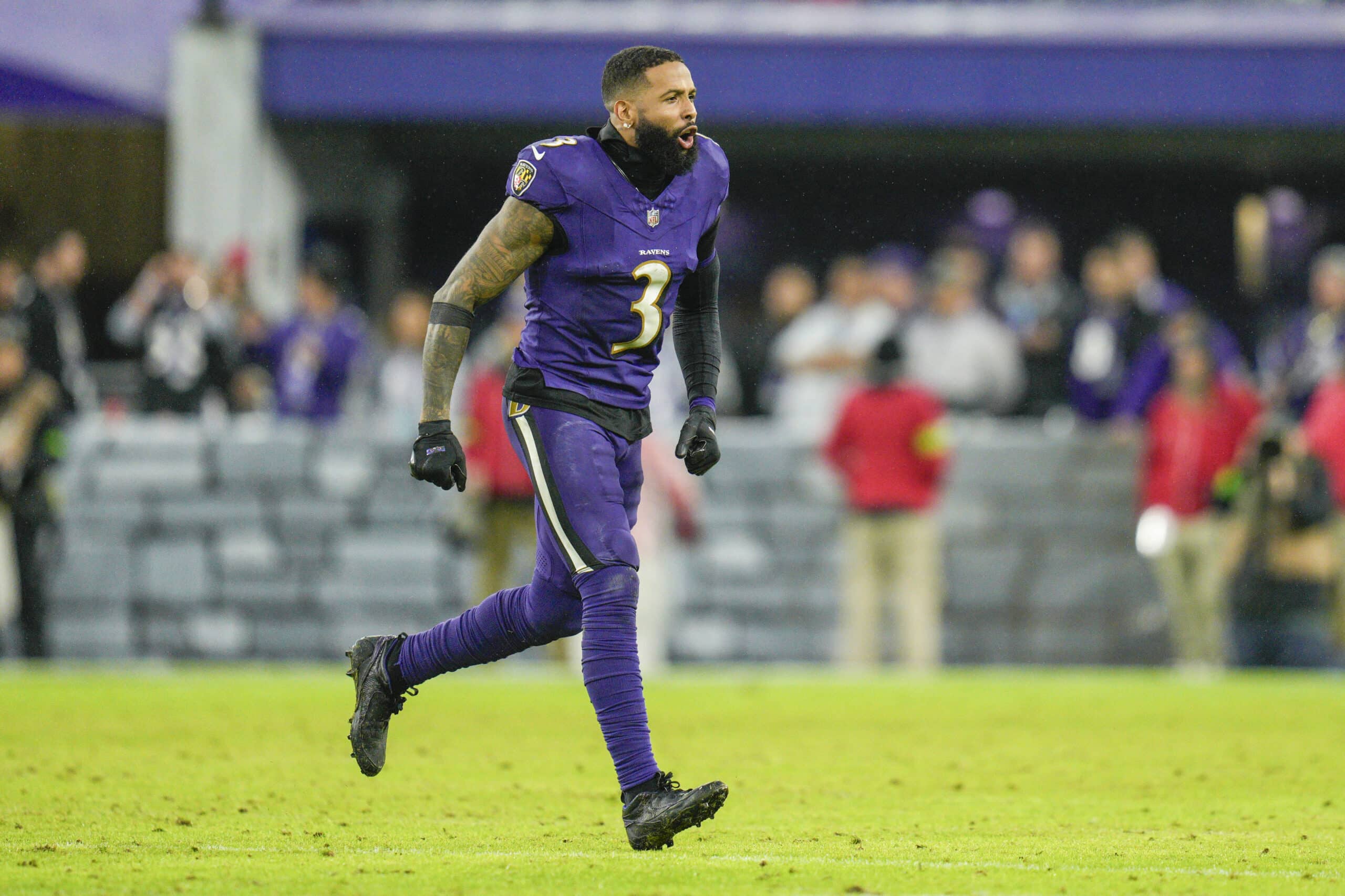 Dec 10, 2023; Baltimore, Maryland, USA; Baltimore Ravens wide receiver Odell Beckham Jr. (3) celebrates after winning the coin toss before overtime against the Los Angeles Rams at M&T Bank Stadium. 