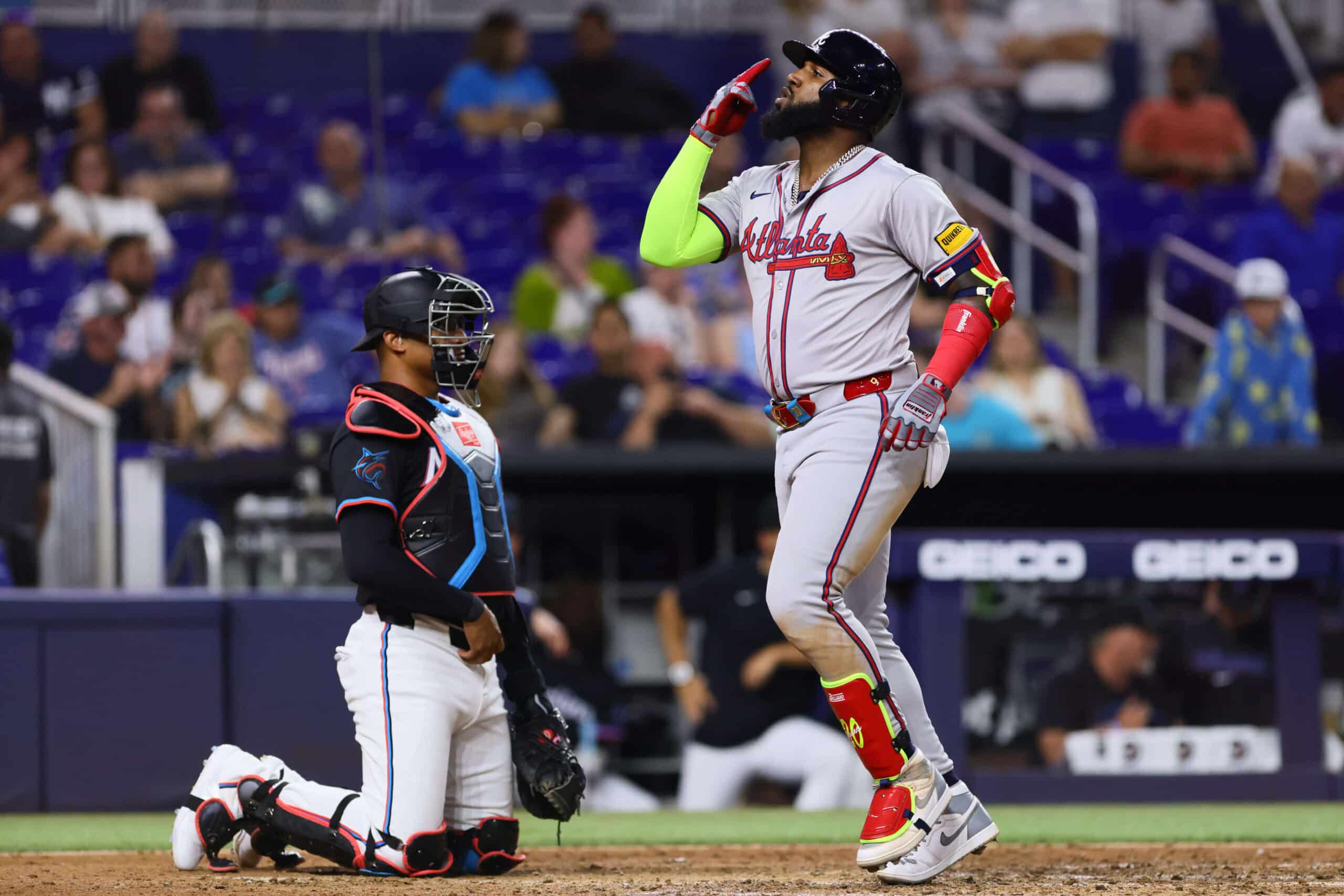 Apr 12, 2024; Miami, Florida, USA; Atlanta Braves designated hitter Marcell Ozuna (20) reacts after hitting a home run against the Miami Marlins during the ninth inning at loanDepot Park. 
