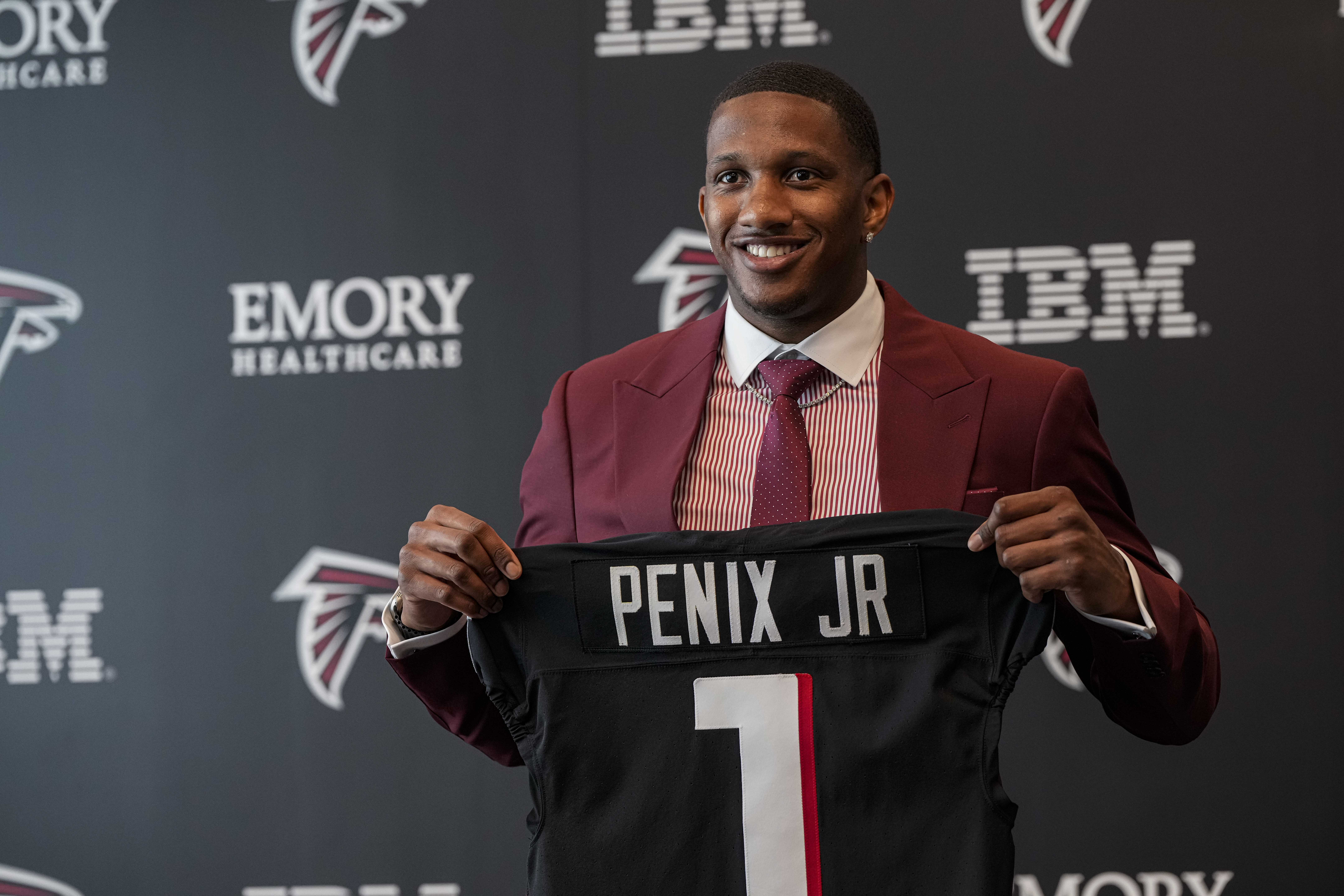 Apr 26, 2024; Flowery Branch, GA, USA; Atlanta Falcons first round draft pick quarterback Michael Penix Jr talks to the media at a press conference introducing him at the Falcons training complex.