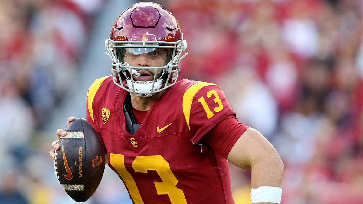 USC Trojans quarterback Caleb Williams (13) scrambles during the second quarter against the UCLA Bruins at United Airlines Field at Los Angeles Memorial Coliseum.