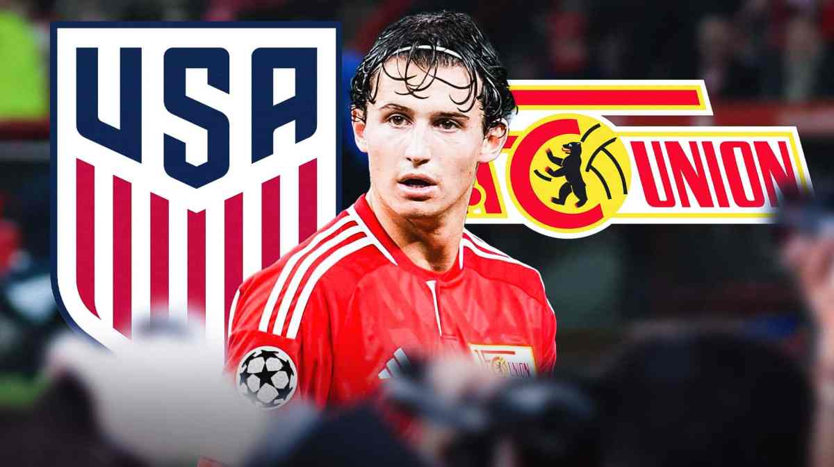 Brenden Aaronson in front of the USMNT and Union Berlin logos