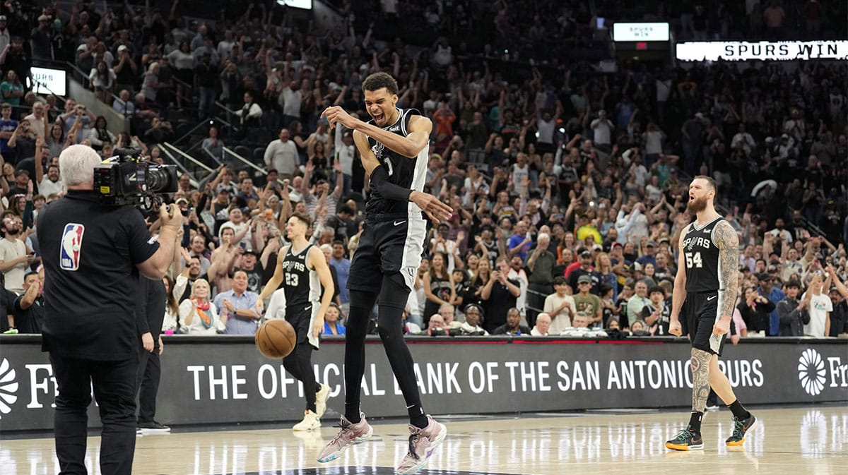 San Antonio Spurs forward Victor Wembanyama (1) reacts after a victory over the Denver Nuggets at Frost Bank Center.