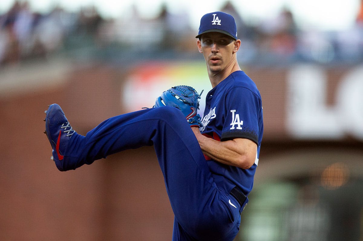 Los Angeles Dodgers starting pitcher Walker Buehler (21) delivers a pitch against the San Francisco Giants during the second inning at Oracle Park.