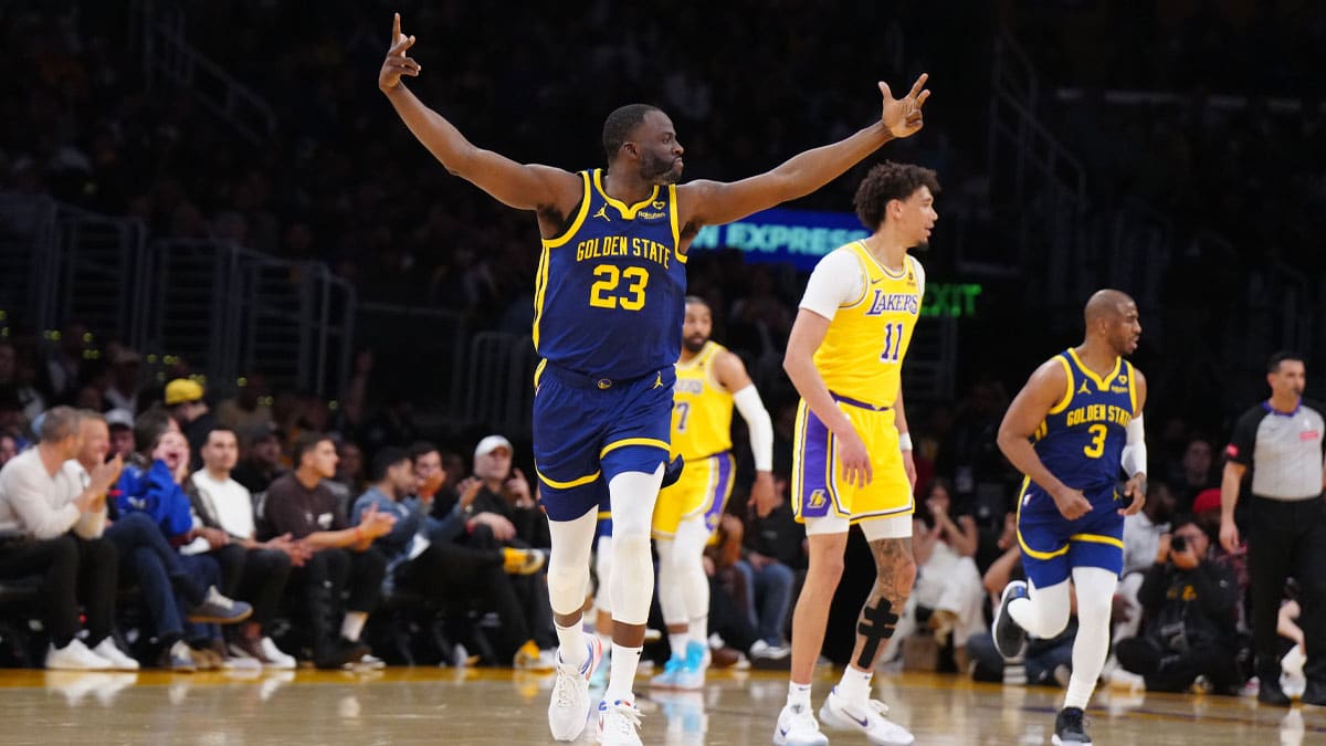 Golden State Warriors forward Draymond Green (23) celebrates in the first half against the Los Angeles Lakers at Crypto.com Arena.