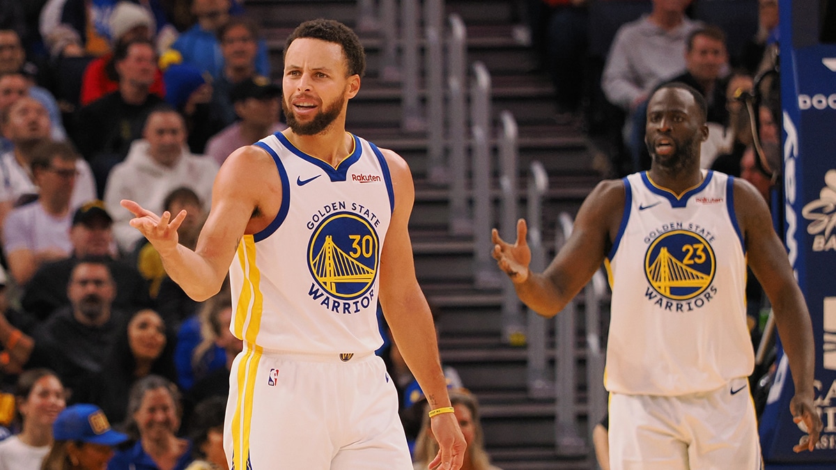 Golden State Warriors guard Stephen Curry (30) and forward Draymond Green (23) question the referee after a play against the Portland Trail Blazers during the fourth quarter at Chase Center