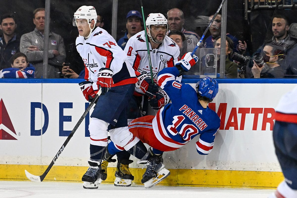 Washington Capitals left wing Alex Ovechkin (8) checks New York Rangers left wing Artemi Panarin (10) during the third period in game two of the first round of the 2024 Stanley Cup Playoffs at Madison Square Garden.