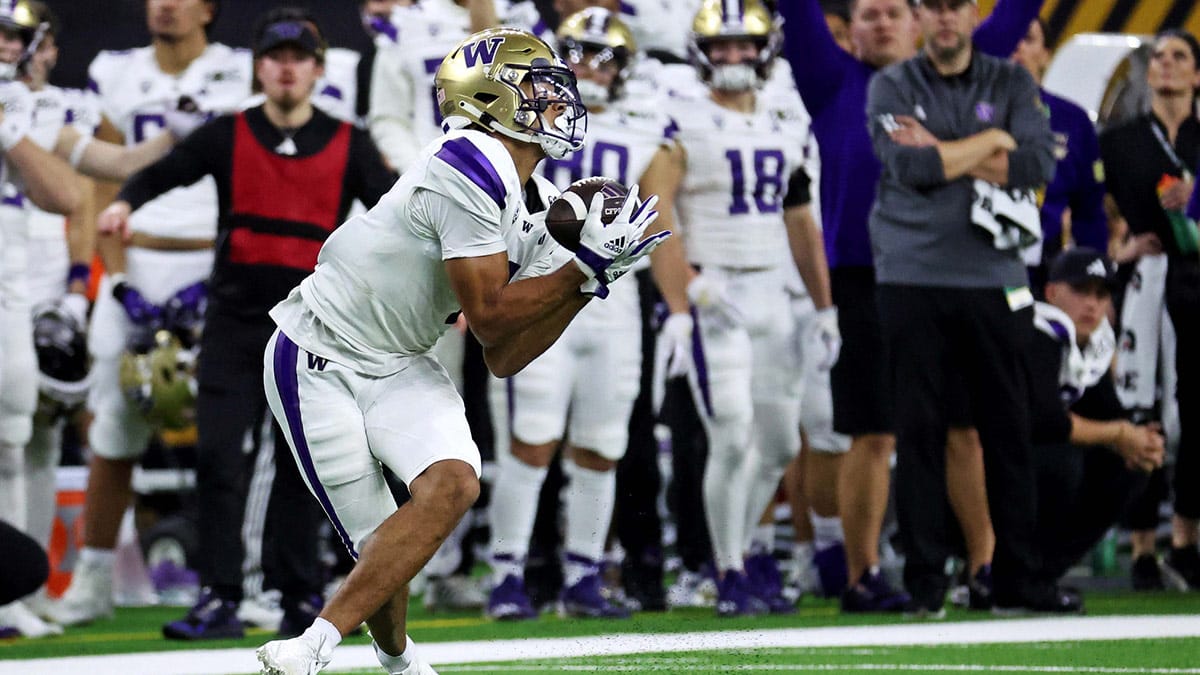 Washington Huskies wide receiver Rome Odunze (1) makes a catch during the fourth quarter against the Michigan Wolverines in the 2024 College Football Playoff national championship game at NRG Stadium.
