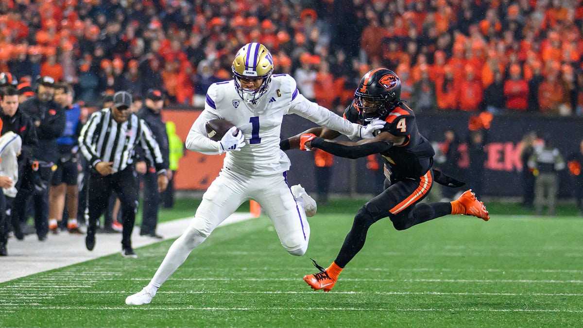 Washington Huskies wide receiver Rome Odunze (1) runs the ball after a catch during the first quarter against the Oregon State Beavers at Reser Stadium. 