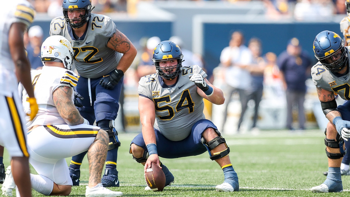 West Virginia Mountaineers offensive lineman Zach Frazier (54) during the first quarter against the Towson Tigers at Mountaineer Field at Milan Puskar Stadium. 