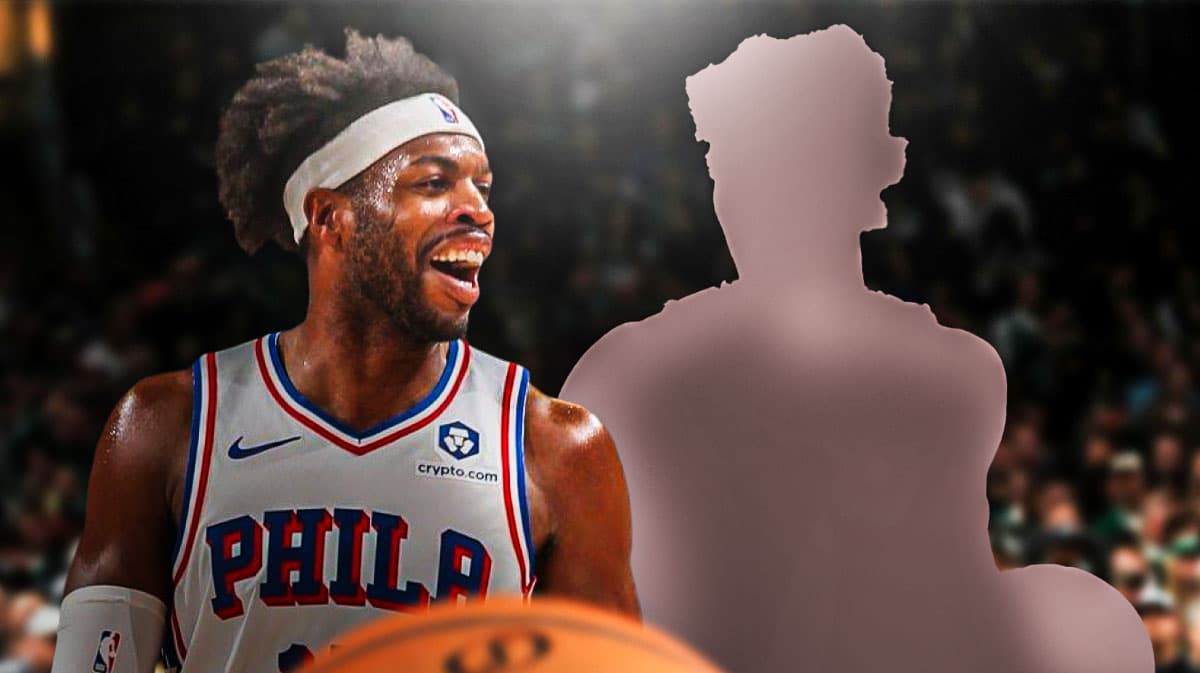 Sixers' Buddy Hield smiling, with silhouette of Jazz's Lauri Markannen beside him
