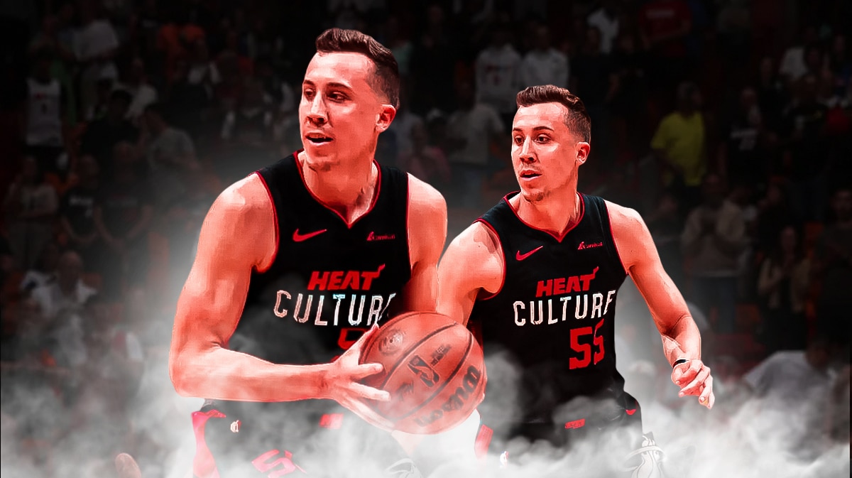 Miami Heat star Duncan Robinson in front of the Kaseya Center.