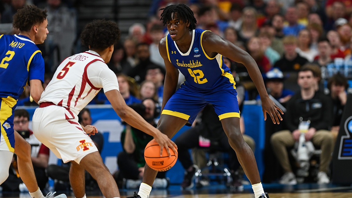 South Dakota State's forward William Kyle III (42) defends the ball during the first half on Thursday, March 21, 2024 at the CHI Health Center in Omaha, Nebraska.