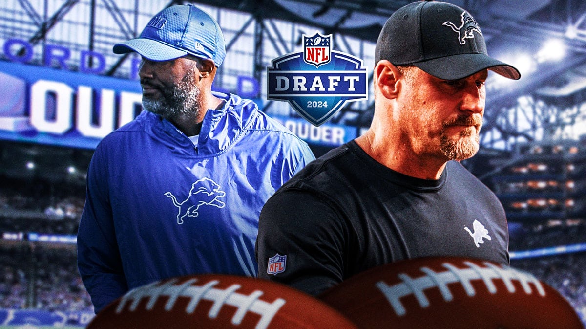 Detroit Lions head coach Dan Campbell and general manager Brad Holmes with the logo for 2024 NFL Draft between them