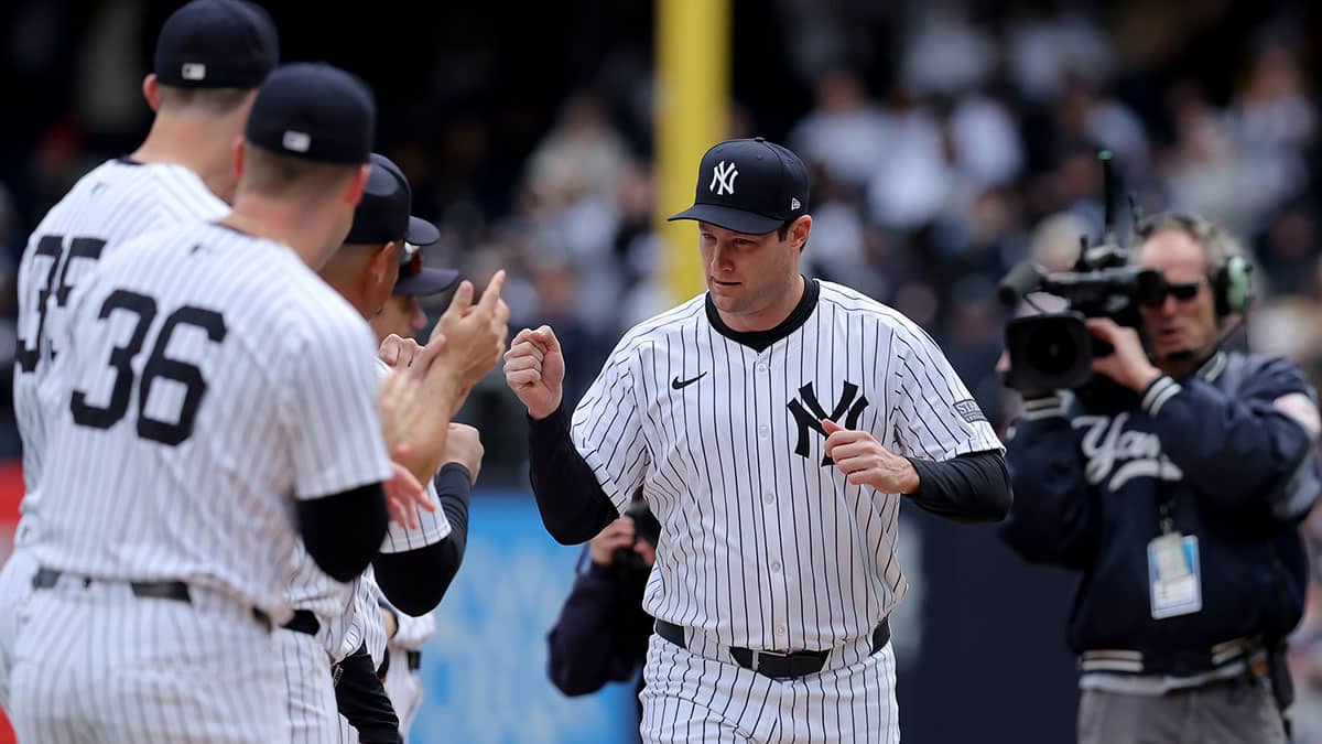 New York Yankees injured starting pitcher Gerrit Cole (45) is introduced before an opening day game against the Toronto Blue Jays at Yankee Stadium.