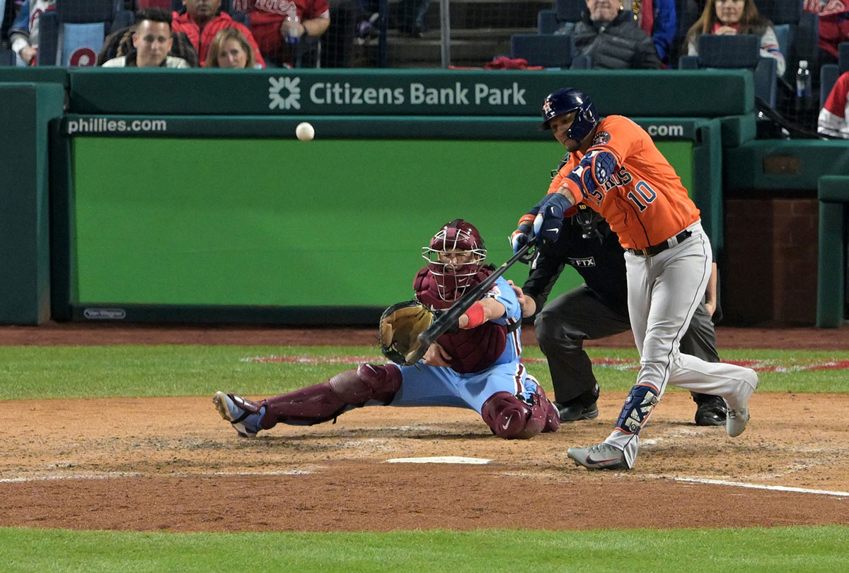 Houston Astros first baseman Yuli Gurriel (10) hits a double against the Philadelphia Phillies during the seventh inning in game five of the 2022 World Series at Citizens Bank Park. 