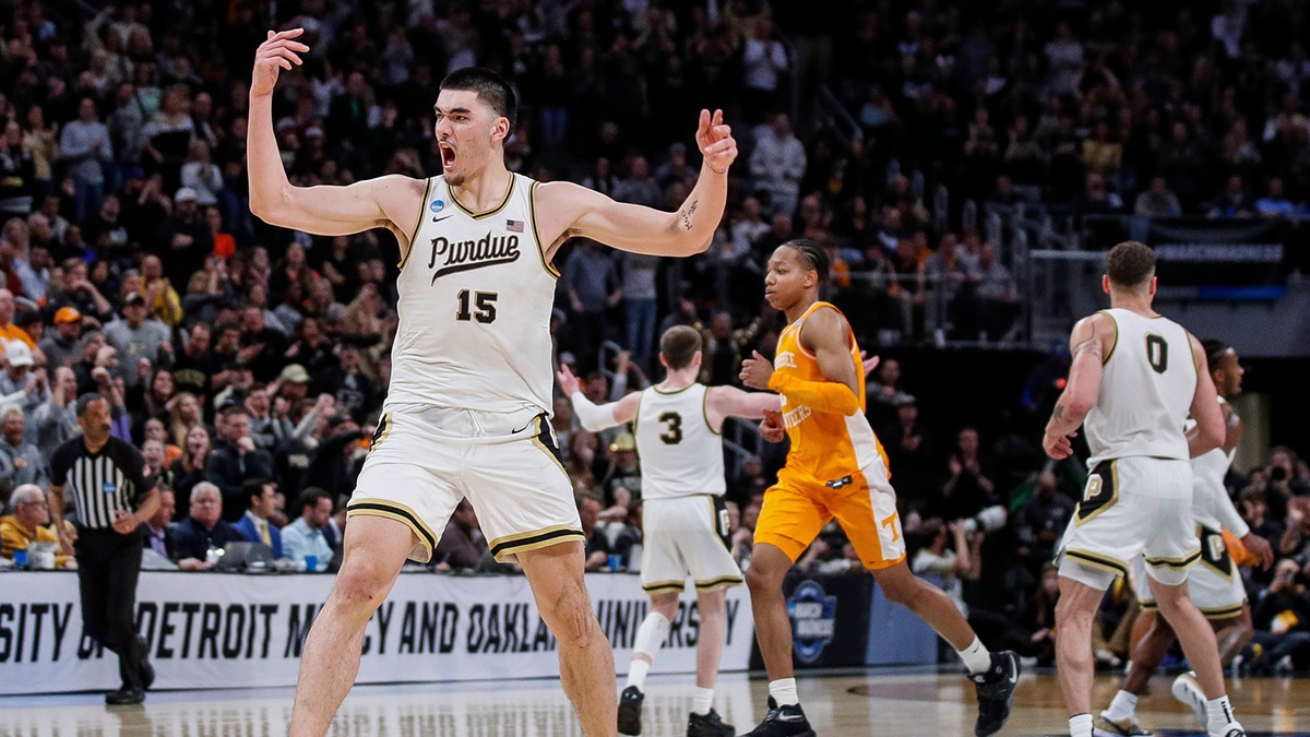 Purdue center Zach Edey celebrates a play against Tennessee during the second half of the NCAA tournament Midwest Regional Elite 8 round at Little Caesars Arena in Detroit on Sunday, March 31, 2024. Edey's 40 points helped the Boilermakers to a 72-66 win and their first Final Four since 1980.