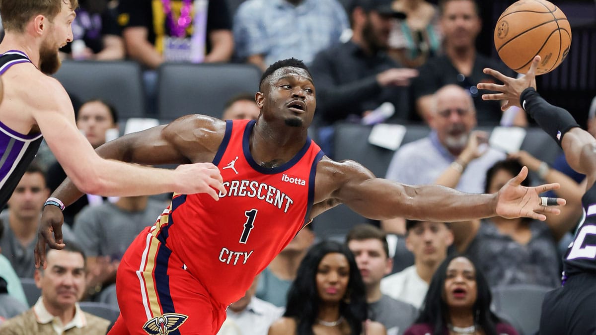 New Orleans Pelicans forward Zion Williamson (1) stretches for a lose ball during the first quarter against the Sacramento Kings at Golden 1 Center. 