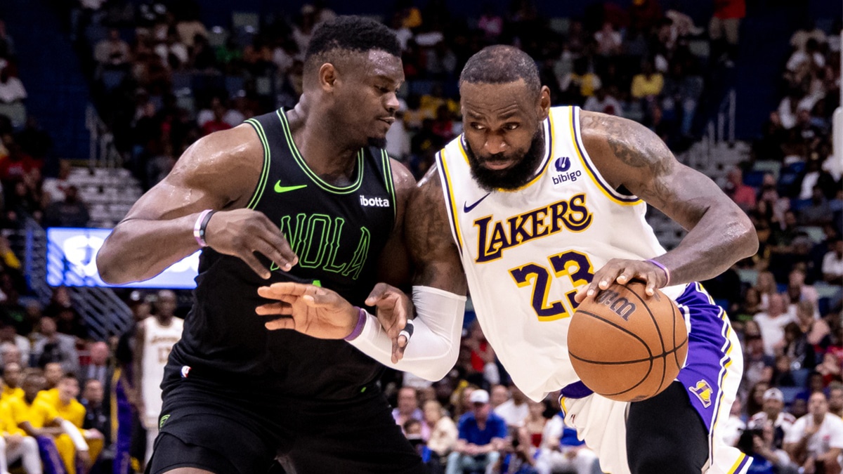 Los Angeles Lakers forward LeBron James (23) dribbles against New Orleans Pelicans forward Zion Williamson (1) during the second half at Smoothie King Center. 