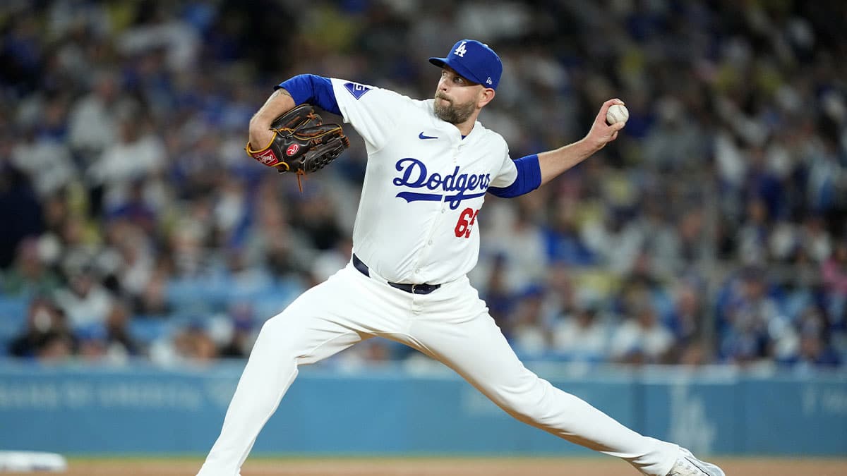 Los Angeles Dodgers starting pitcher James Paxton (65) throws in the third inning against the San Francisco Giants at Dodger Stadium