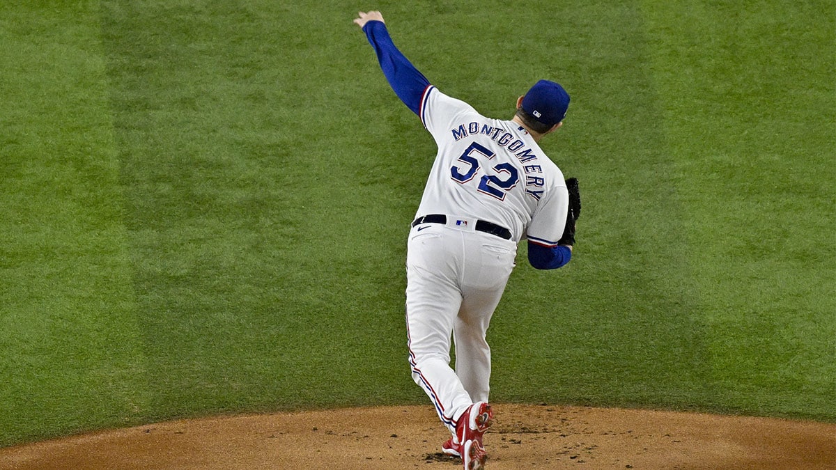 Texas Rangers starting pitcher Jordan Montgomery (52) pitches against the Arizona Diamondbacks during the first inning in game two of the 2023 World Series at Globe Life Field.