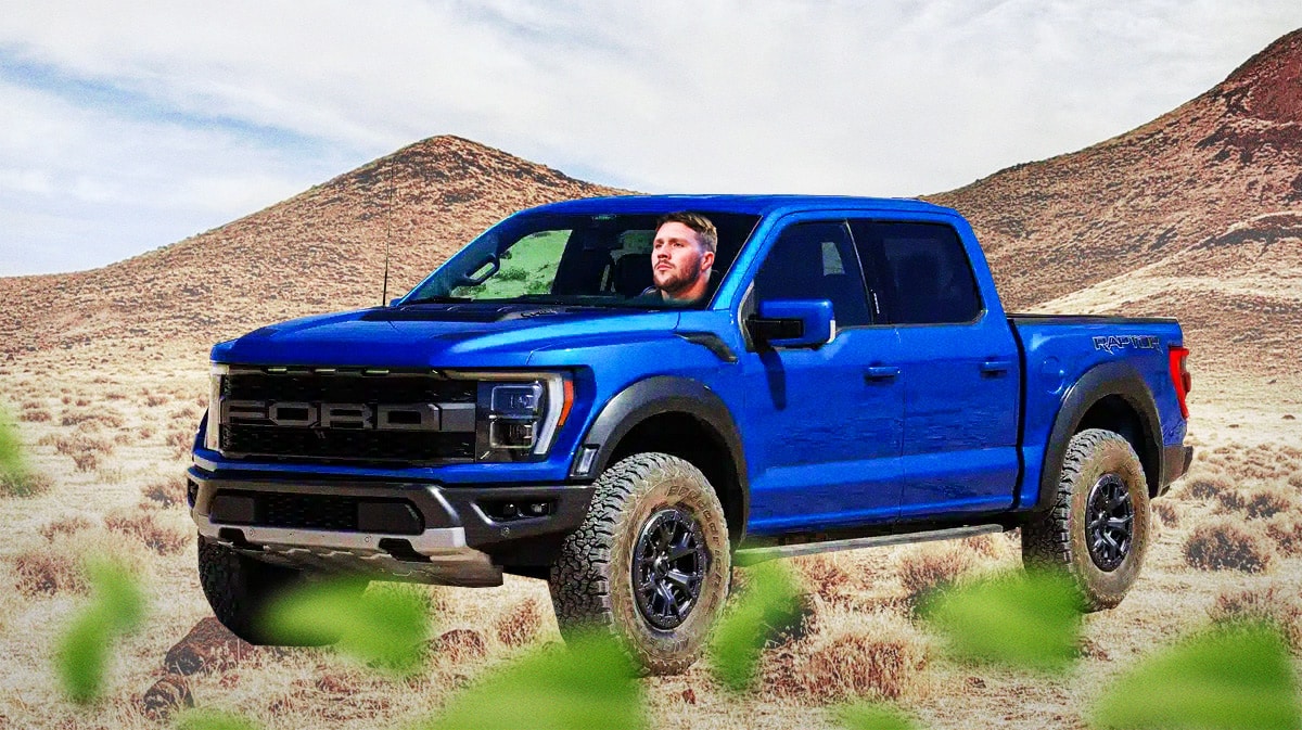 Josh Allen inside a pickup in his car collection.
