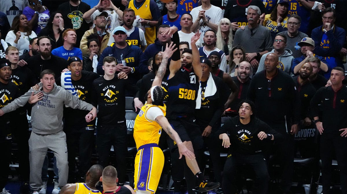 Denver Nuggets guard Jamal Murray (27) shoots over Los Angeles Lakers forward Anthony Davis (3) in the fourth quarter during game two during the 2024 NBA playoffs at Ball Arena.