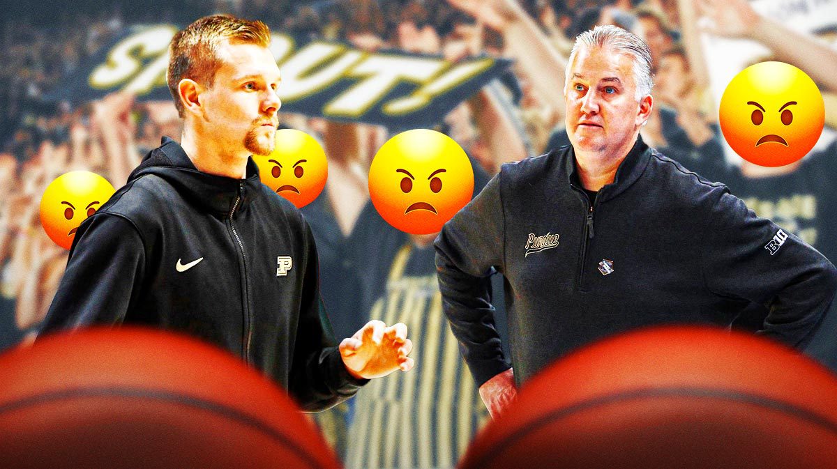 Purdue basketball coach Matt Painter looking at Carson Barrett.