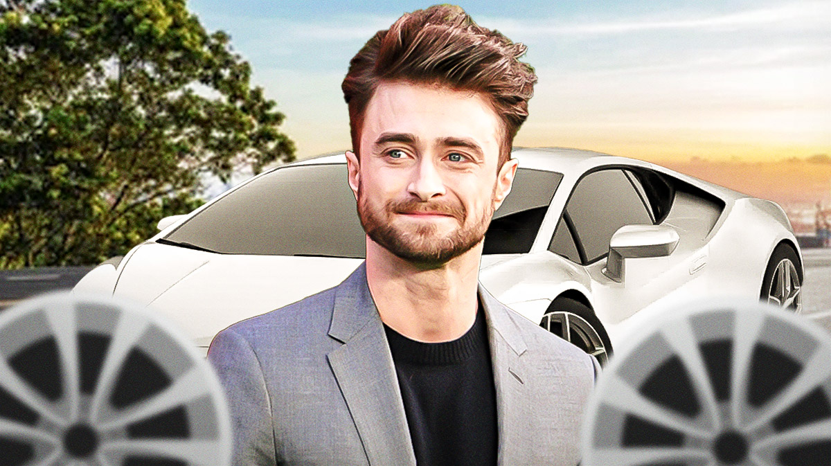 Daniel Radcliffe in front of a car from his collection.