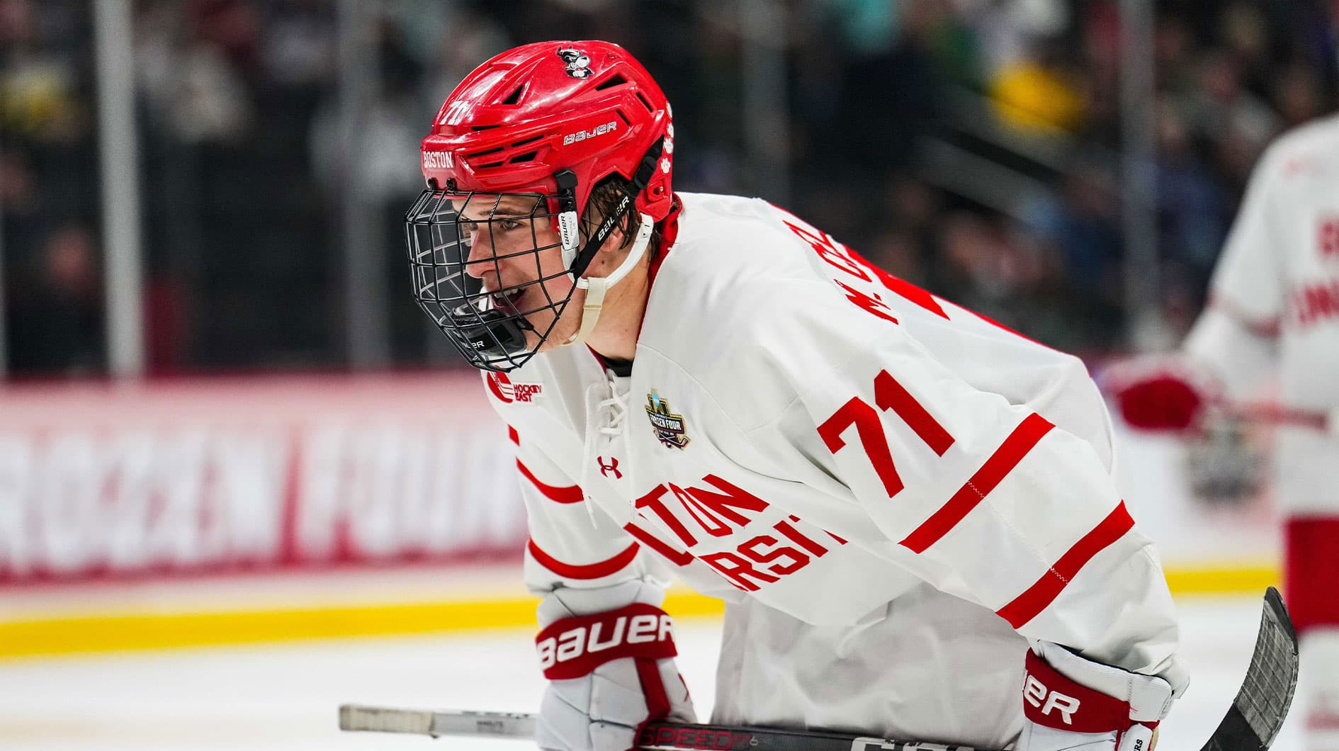 Boston U. forward Macklin Celebrini (71) looks on in the semifinals of the 2024 Frozen Four college ice hockey tournament during the first period against the Denver at Xcel Energy Center.