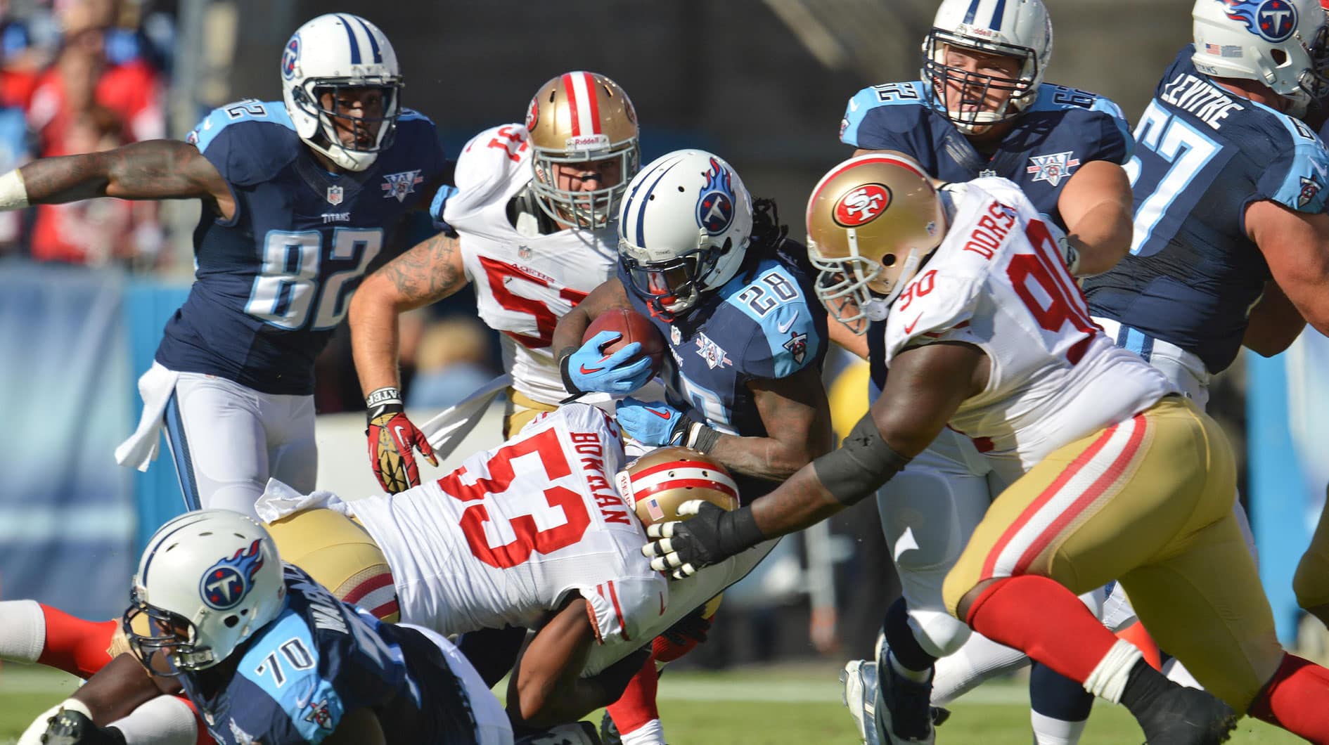 Tennessee Titans running back Chris Johnson (28) is tackled by San Francisco 49ers linebacker NaVarro Bowman (53) during the first half at LP Field. 