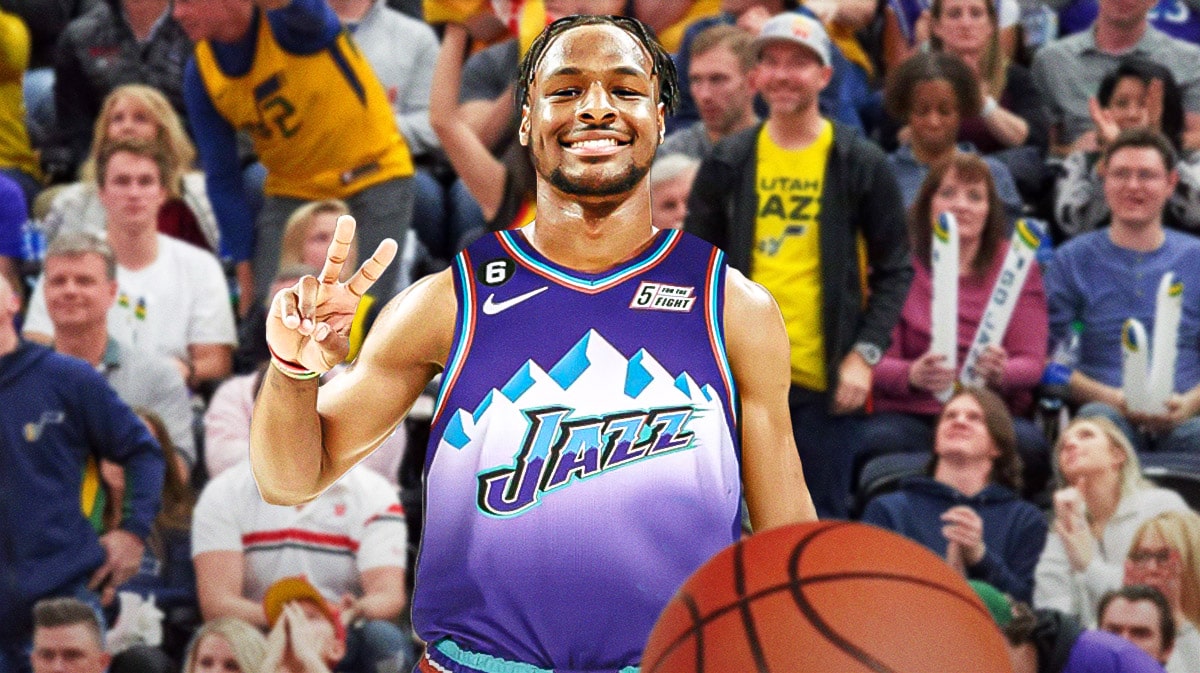 Bronny James in a Utah Jazz uniform in front of the Delta Center.