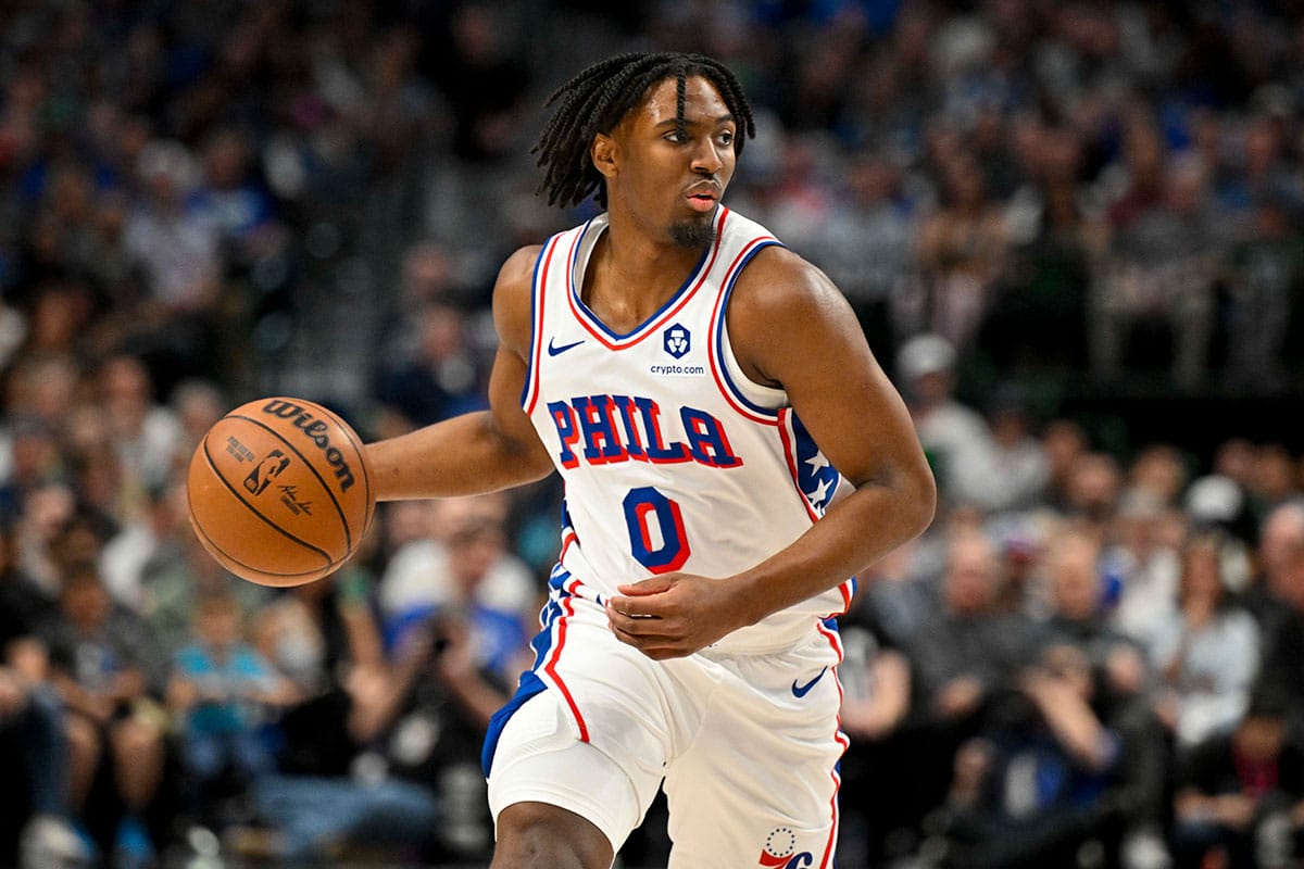 Philadelphia 76ers guard Tyrese Maxey (0) brings the ball up court against the Dallas Mavericks during the first half at the American Airlines Center. 