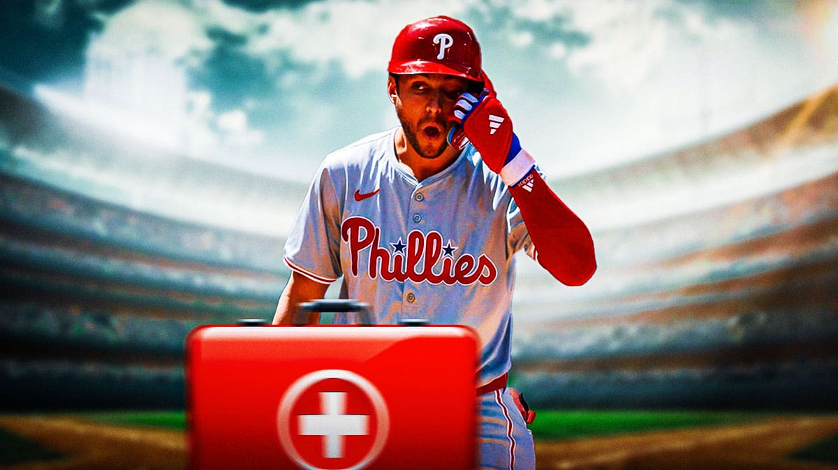Philadelphia Phillies' Trea Turner with a medical bag on him.