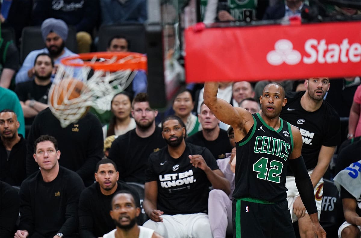 Boston Celtics center Al Horford (42) makes a three point basket against the Cleveland Cavaliers in the fourth quarter during game five of the second round for the 2024 NBA playoffs at TD Garden. 